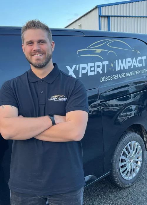 a man standing in front of a black van